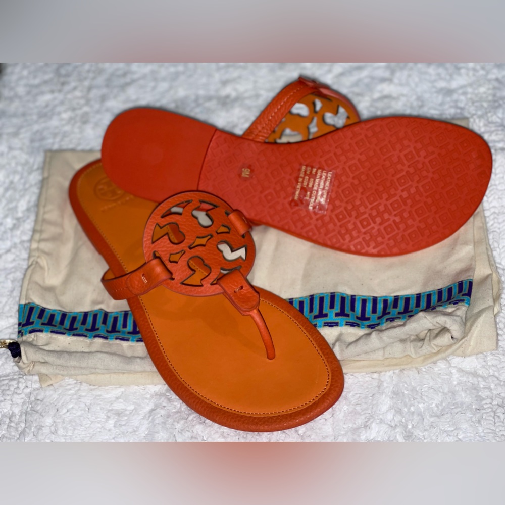 Tory Burch Orange Sandal size 9 Brand New Never worn with Dust bag and box.